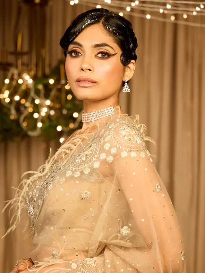 This shot shows the full effect of the glittery, vintage hairstyle. It's a real showstopper and perfect for a bride who wants a unique cocktail look.