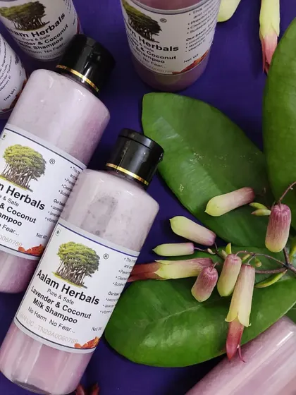 This is my Lavender & Coconut Milk Shampoo, a favorite for its calming scent and moisturizing properties. It's formulated to leave hair frizz-free, soft, and beautifully conditioned after every wash.