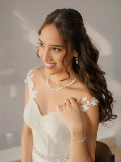 Abigail, looking absolutely radiant. Her half-up hairstyle and fresh, glowing makeup created a look that was both elegant and effortlessly beautiful.