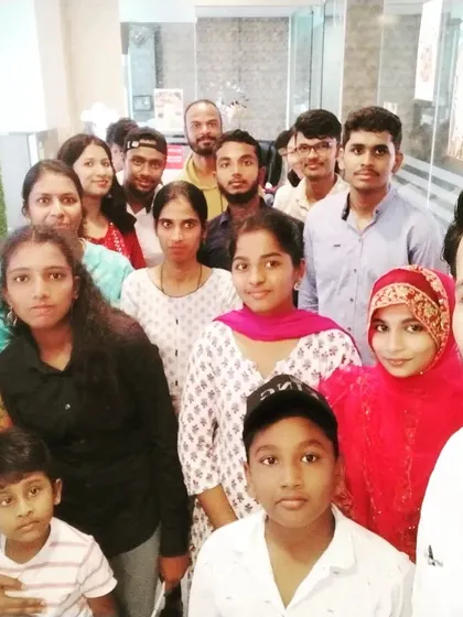 A candid group photo capturing the friendly atmosphere at our academy. We pride ourselves on creating a space where students feel comfortable and connected.