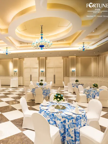 I believe every grand celebration deserves a breathtaking setting. My main banquet hall, with its magnificent chandeliers and classic checkered flooring, provides a truly elegant canvas for your most important life events, from weddings to milestone anniversaries.