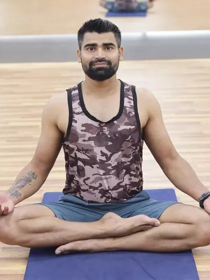 A moment of quiet reflection in a simple seated pose. The goal is to find "Shanti," or peace, by calming the fluctuations of the mind and centering the self in the present moment.