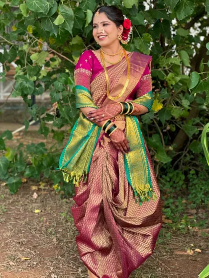 A full-length shot of a bride in a traditional Nauvari saree. My courses also include guidance on how makeup and hair complement the entire bridal ensemble.