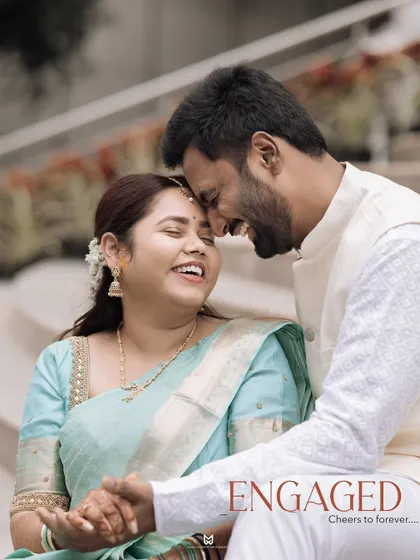 A beautiful close up portrait of the newly engaged couple. This shot is all about their happy smiles and the beginning of their forever.