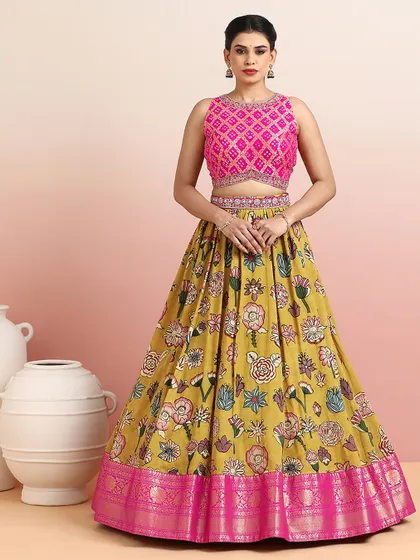Our festive bestsellers include this vibrant floral lehenga, a timeless silhouette crafted with rich detailing.