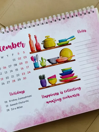 A close-up of the September page from my 2023 calendar. The theme is 'Happiness is collecting amazing cookwares', with a notes section and a list of holidays for the month.
