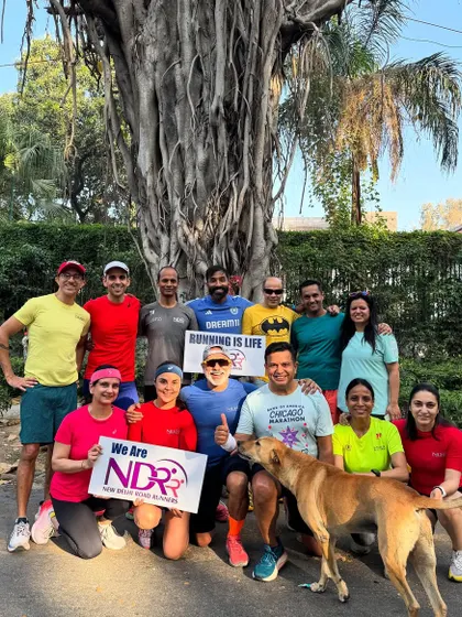 Another great group shot under the banyan tree. We hold up our signs with pride because we are the New Delhi Road Runners, and for us, running truly is life.