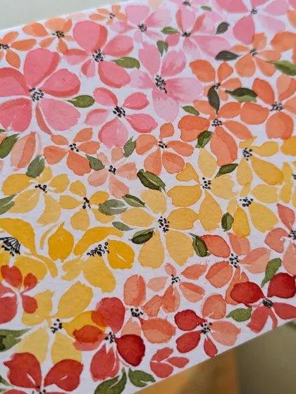 Practicing my one-stroke florals. This piece is a gradient of warm colors, from soft pinks to deep reds, showing how simple strokes can build into a beautiful, dense pattern. This technique is great for creating custom greeting cards or pattern designs.