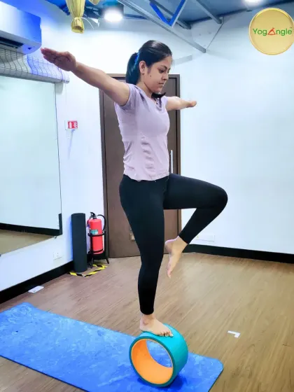 The yoga wheel is not just for stretching; it's also a powerful tool for improving balance. Standing on the wheel requires immense focus and core engagement, helping you discover your stability from the inside out.