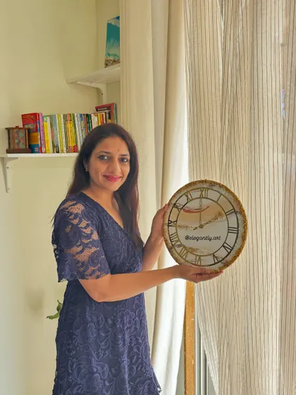 A candid shot of me with one of my creations. The Ghibli-inspired trend is so much fun, and I love bringing my clients' creative ideas to life in these beautiful clocks.