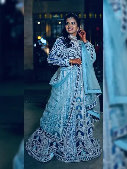 This is for the reception or sangeet night where you want all eyes on you. I designed this stunning ice blue lehenga with intricate, heavy embroidery that sparkles with every movement. It’s a true showstopper available for rent.