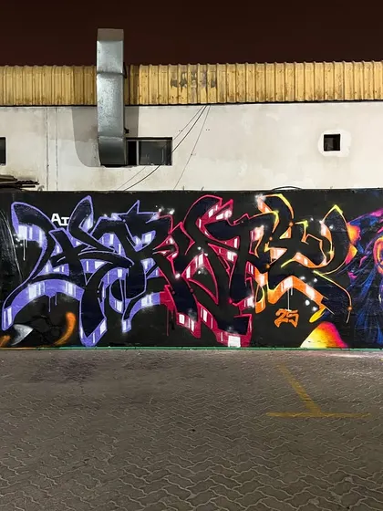 A collaborative wall in Dubai with my Indonesian bros. We all used the same colors but did our own thing, mixing portraits and wildstyle graffiti.