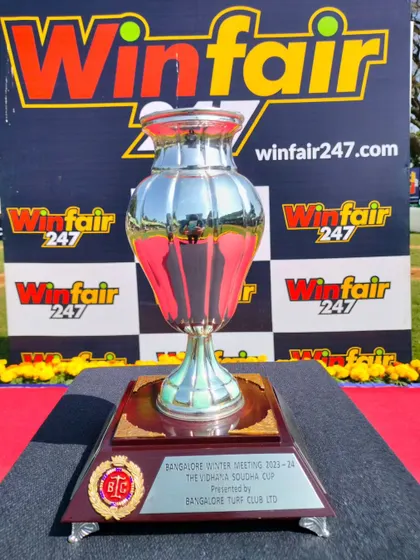 The Vidhana Soudha Cup, a classic silver urn-style trophy.