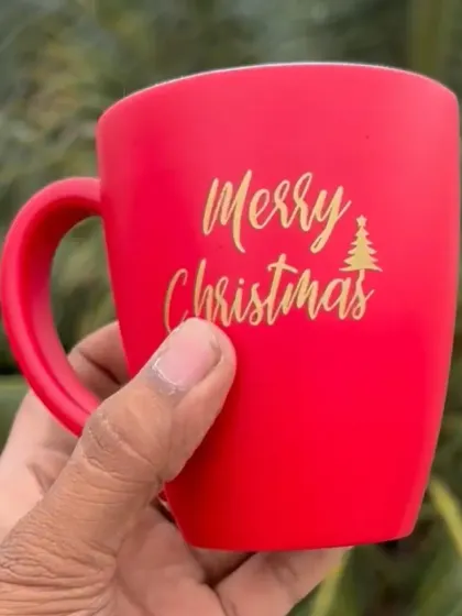 Get into the festive spirit with this red "Merry Christmas" mug. It's a simple and cheerful gift for the holiday season.
