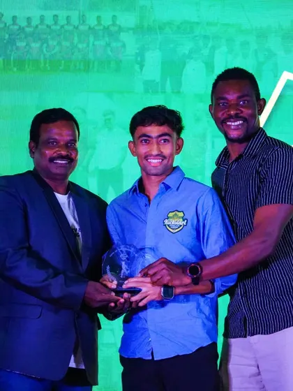 U-21 sensation Bishwas receives his award for the People's Choice Goal of the Season after his brilliant curling finish.