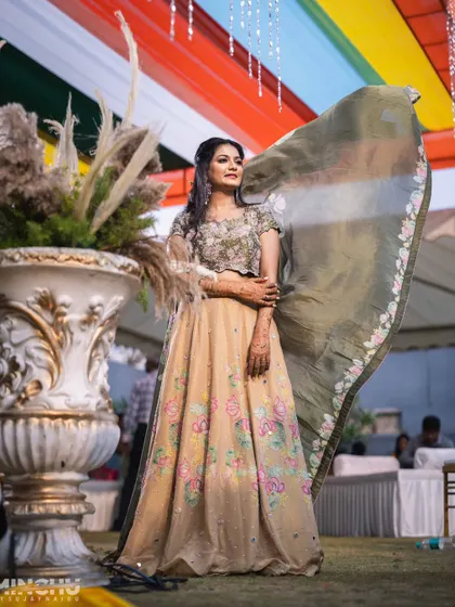 The bride's lehenga in motion. The makeup is designed to be flawless from every angle, whether she's posing or caught in a candid moment.