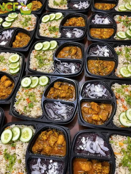 An overhead shot of my veg pulao and fish curry combo meals. The vibrant colors and fresh cucumber slices show the care I put into every single meal box.