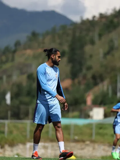 A candid shot of me observing a training session in Bhutan. This reflects the constant analysis and thought that goes into designing and executing elite training programs.