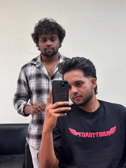 A mirror selfie with Harsh Dubey showing off his voluminous hairstyle.