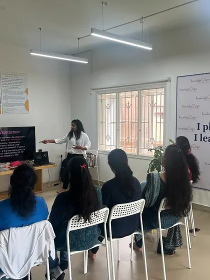 Another view of a phonics training session in progress. The setting is comfortable and intimate, allowing for focused learning and easy interaction between me and the participants.
