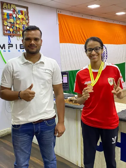 Veyanka Daga with Coach Aaditya Rastogi after securing a bronze medal at the Capt. Ezekiel Match. This teamwork is at the core of our training philosophy.