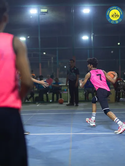 Two players face off during a game, showcasing the competitive spirit and sportsmanship I foster.