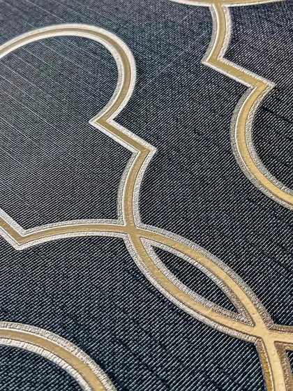 This luxurious 3D-looking wallpaper features a dark, textured background with a geometric pattern in gold and silver. It's a perfect choice for transforming your space with elegance.