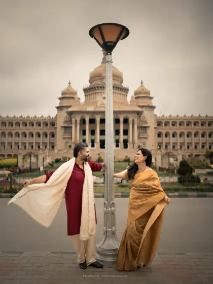 A playful moment in front of the grand Vidhana Soudha. We love incorporating iconic Bangalore landmarks into your pre-wedding story.