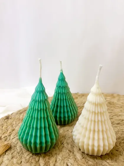 Introducing our new Spiky Christmas Tree candle. It's a unique, textured design that we're so excited about.