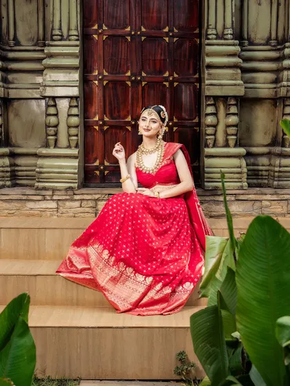 A seated pose that offers a different perspective on this beautiful outfit.