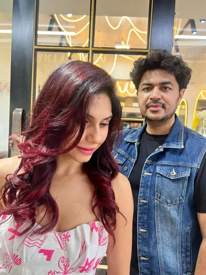 Here I am with the client after her red hair transformation. A successful makeover always ends with a happy client.