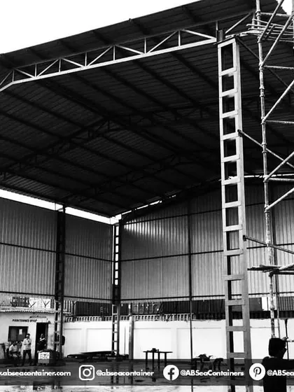 The internal framework of a large prefabricated steel structure under construction. This image highlights the robust engineering and aesthetic quality of the building's skeleton.