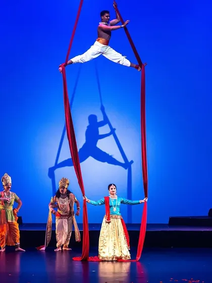 I love pushing creative boundaries. In this scene from our US tour, we blended classical Indian dance with contemporary aerial silk performance, creating a breathtaking visual that tells a story of divinity and power. This is how we make traditional stories feel new and exciting.