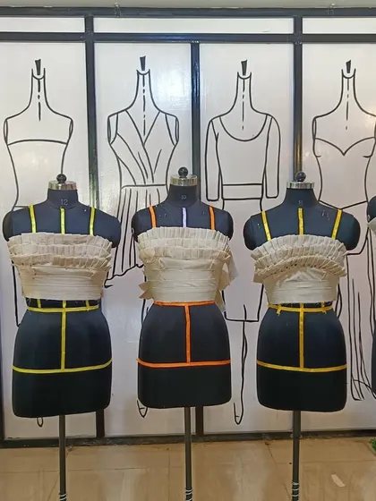 Students' work on creating ruffled and textured bodices through fabric manipulation and draping. This is a key skill for adding unique details to custom clothing.