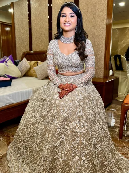 Another full-length shot, showcasing the beautiful details of her outfit.