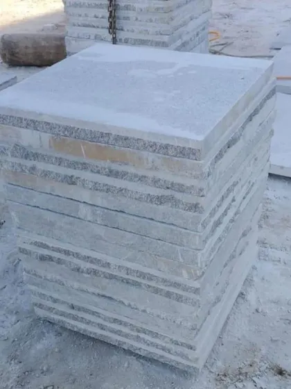 A stack of square-cut paving stones.