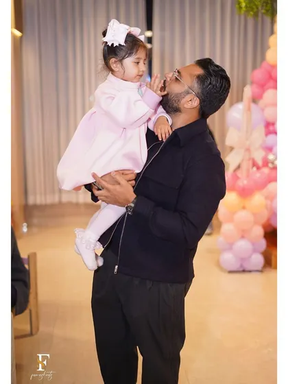 A tender moment between a father and his daughter during her Barbie-themed birthday party. We create the perfect setting for these beautiful family memories.