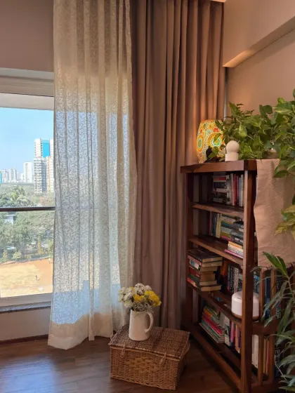 This cozy corner is one of my absolute favorites. The combination of our soft, flowy sheer curtains and solid drapes creates the perfect light for getting lost in a good book or a moment of quiet meditation.