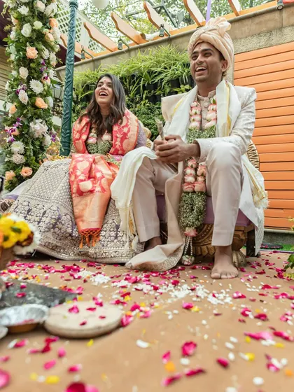 The couple sharing a laugh during their intimate wedding ceremony in Delhi. These are the moments that define the day.