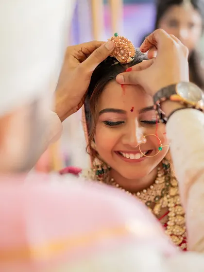 The sindoor moment is so special. I always make sure the bride's makeup is subtle enough to let these traditions take center stage, with just a beautiful, radiant glow.