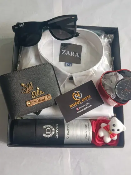 This all-in-one gift hamper is perfect for a birthday, featuring a personalized wallet, a white shirt, sunglasses, a watch, deodorant, and other small keepsakes.