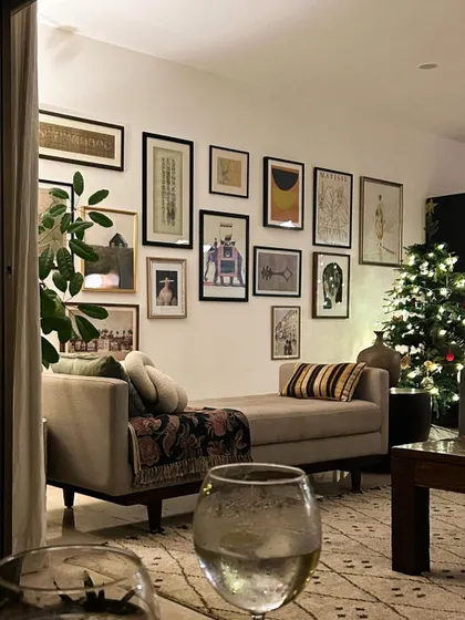 Holiday evenings at home, with the Christmas tree lit up. Our living room is designed to be a cozy and collected space for all seasons.