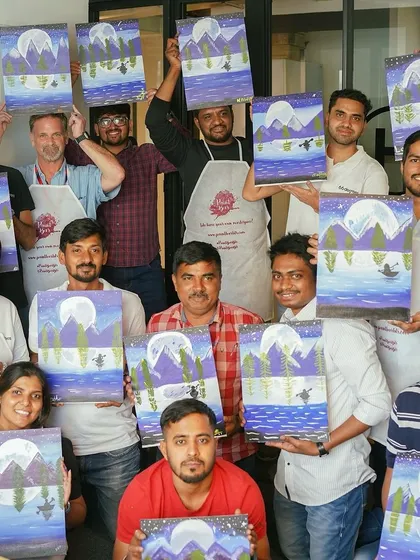 A fantastic group shot from one of our public workshops. It's a great way to unwind, meet new people, and discover your inner artist, even if you've never painted before.