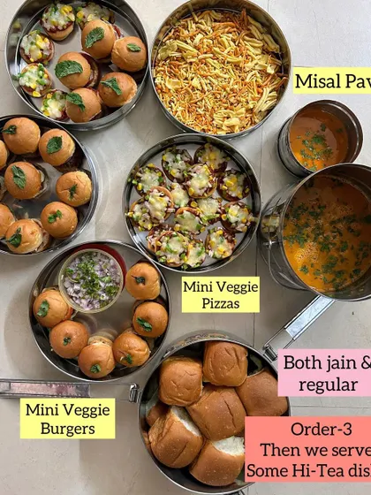 I love catering to families with diverse tastes. This hi-tea order included a mix of Jain and regular dishes like Mini Veggie Pizzas, Mini Veggie Burgers, and Misal Pav, so everyone had something delicious to eat.