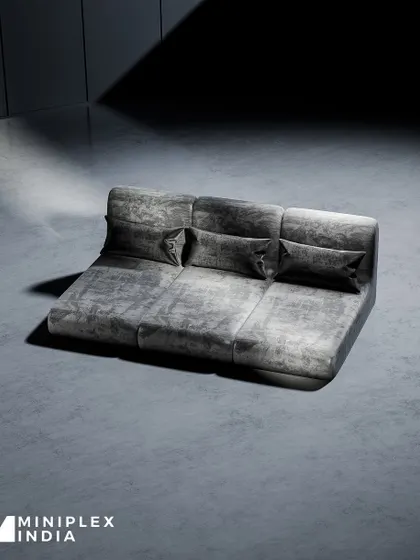The same lounge sofa design shown in a versatile grey fabric. This demonstrates our ability to customize upholstery to match any interior design scheme.