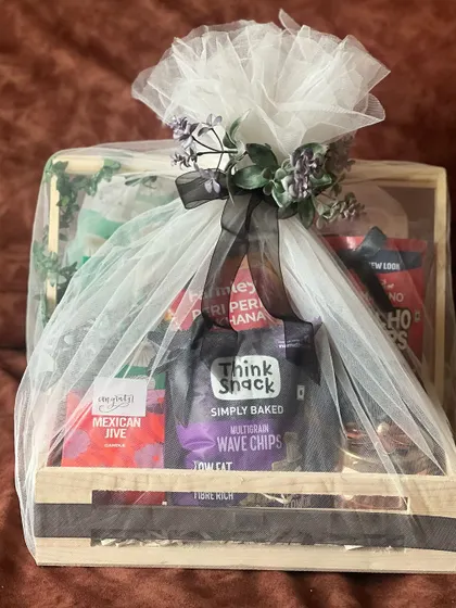 A slightly different angle of the wrapped engagement hamper, showing the elegant presentation that makes the gift feel special.
