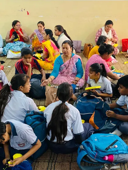 A teacher at the Ayodhya workshop guides her students. It is wonderful to see everyone, young and old, sharing stories and creating together.