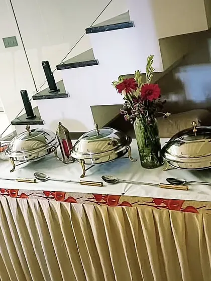 A compact buffet setup for a gathering of 60 guests in Faridabad. The clean lines and simple decor make it a versatile choice for any home.