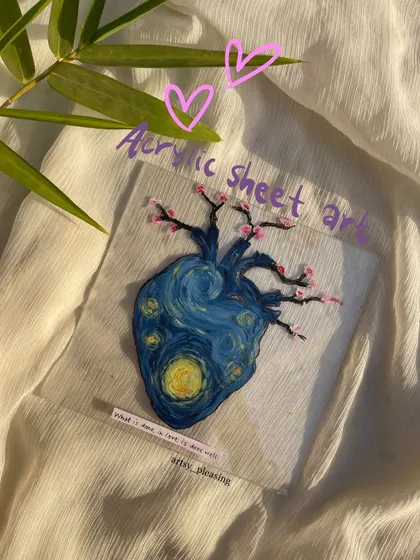A close-up of the Starry Night heart I painted on an acrylic sheet. The transparency of the sheet gives the art a unique, floating effect.