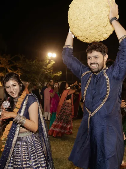 The couple enjoying the garba festivities, a celebration of culture and togetherness.